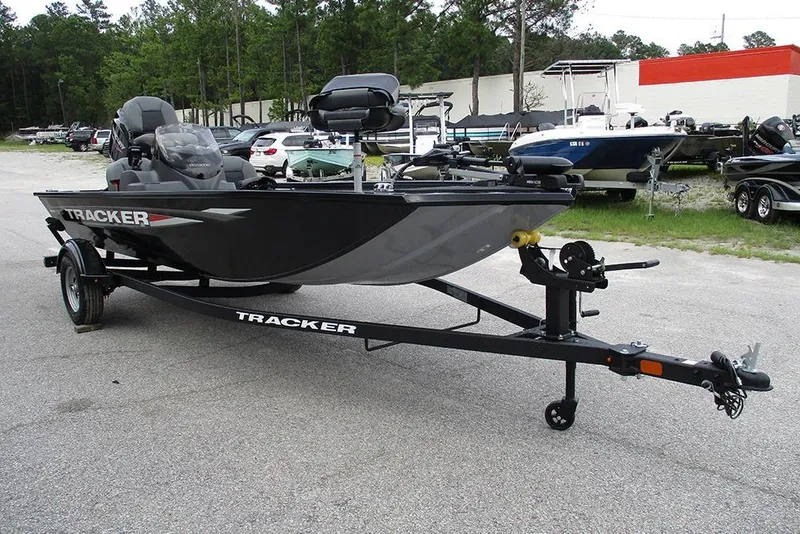 Slide: The Image of 2026 Tracker Pro 170 boat on trailer in outdoor dealership lot. - 3