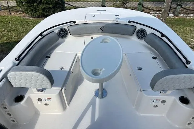 Slide: The Image of 2026 Carolina Skiff 21 Ultra Elite boat interior with seating and table. - 6