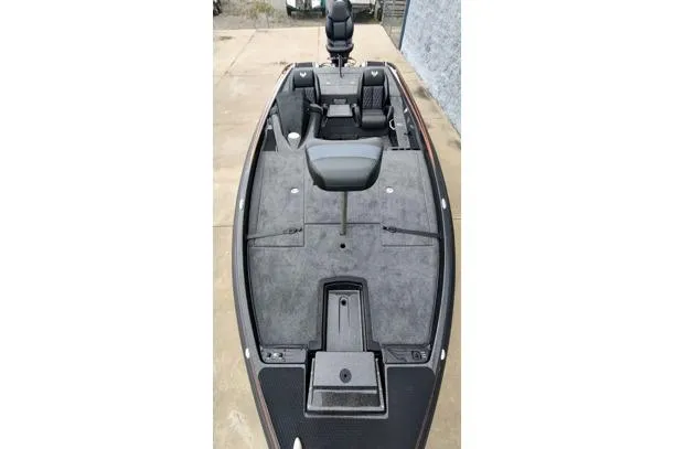 Slide: The Image of 2026 Phoenix 721zxl boat interior with seating and storage compartments. - 4