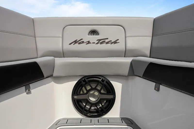 Slide: The Image of 2026 Nor-Tech 390 Sport Center Console interior with speaker and logo detail. - 32