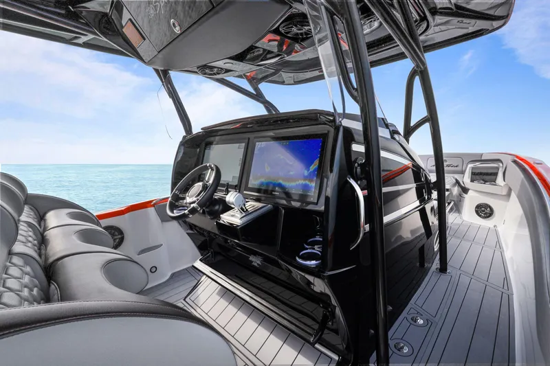 Slide: The Image of 2026 Nor-Tech 390 Sport Center Console interior with advanced navigation system and luxurious seating. - 33