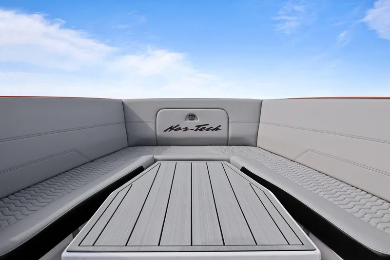 Slide: The Image of 2026 Nor-Tech 390 Sport Center Console interior with sleek seating and modern design. - 42