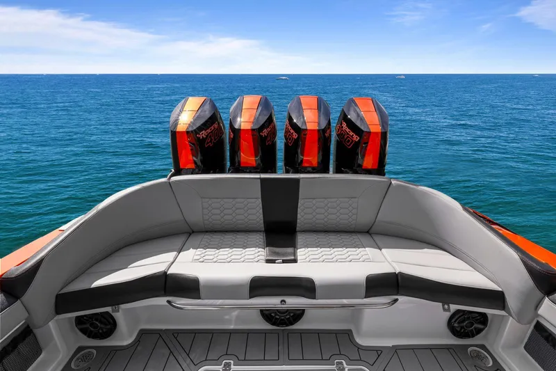 Slide: The Image of 2026 Nor-Tech 390 Sport Center Console with quad engines on open sea. - 45