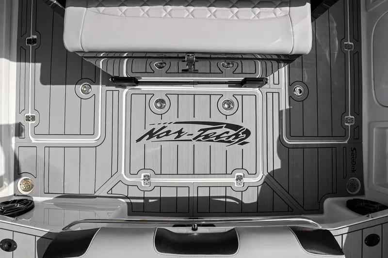 Slide: The Image of 2026 Nor-Tech 390 Sport Center Console boat deck with logo and seating. - 66