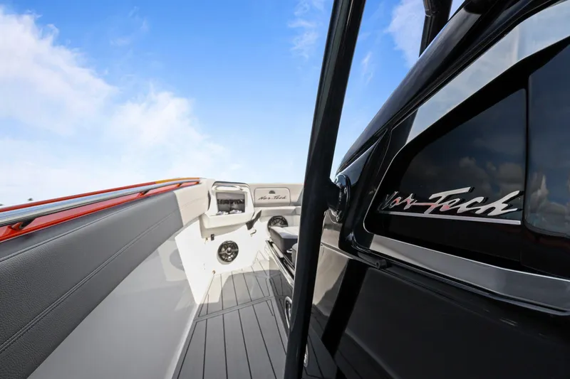 Slide: The Image of 2026 Nor-Tech 390 Sport Center Console interior with sleek design and modern features. - 71