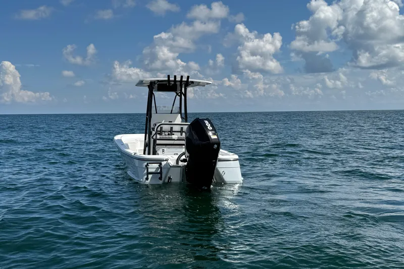 Slide: The Image of 2026 BlackJack 256 Bay boat on trailer, featuring a powerful outboard motor. - 4