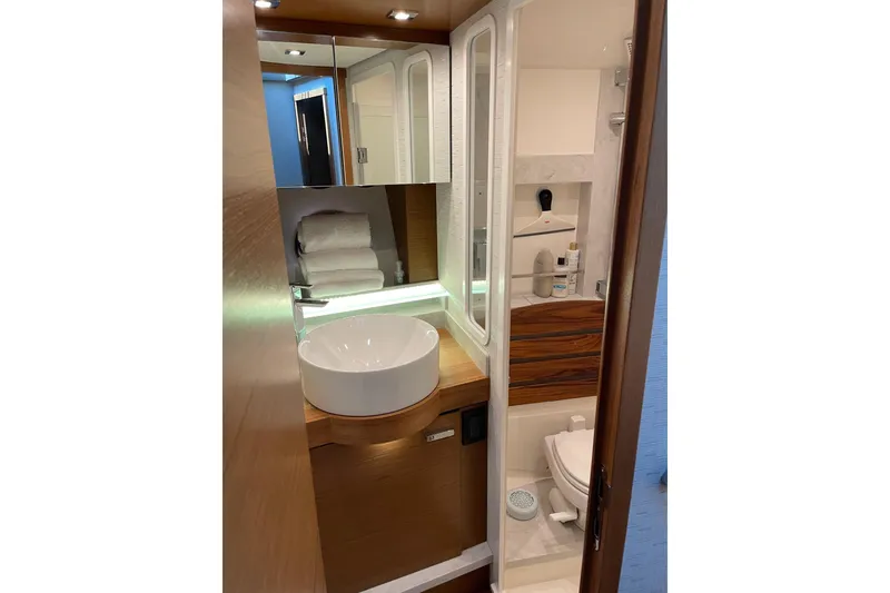 Slide: The Image of Luxurious bathroom in 2023 Tiara Yachts C44 Coupe, featuring modern fixtures and elegant design. - 42