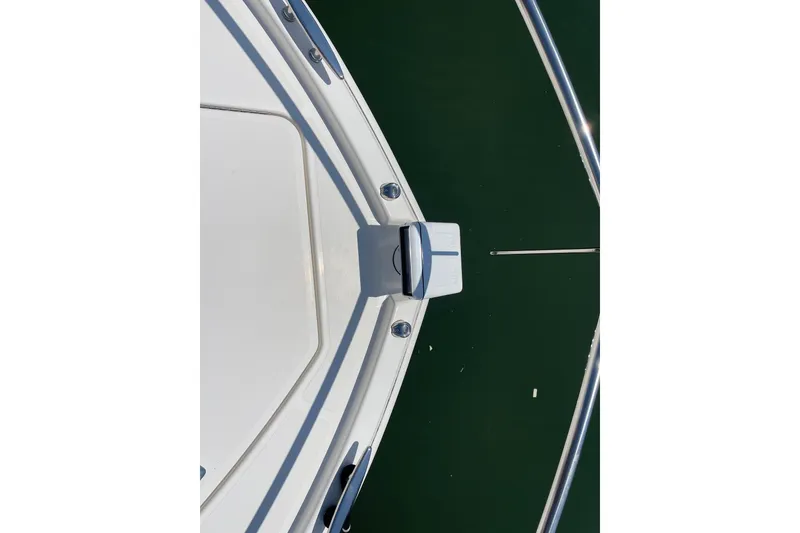 Slide: The Image of Bow view of 2023 Tiara Yachts C44 Coupe on water. - 47