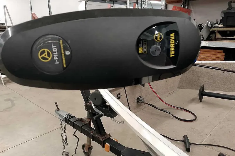 Slide: The Image of Close-up of a 2005 Monark Signature 1601 boat with i-Pilot Terrova motor. - 7