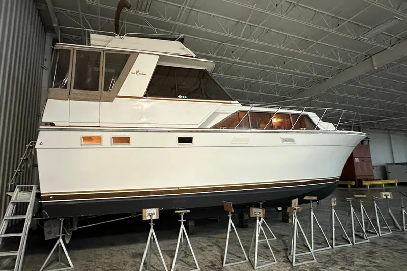 The Image of 1982 Egg Harbor 42 Flybridge Motoryacht in indoor storage on stands. - 0