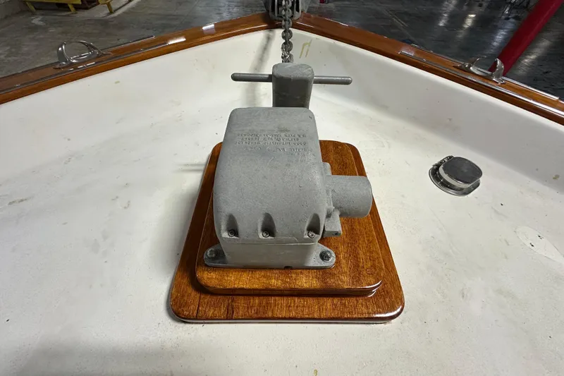 Slide: The Image of Anchor windlass on 1982 Egg Harbor 42 Flybridge Motoryacht deck, showcasing marine equipment. - 11