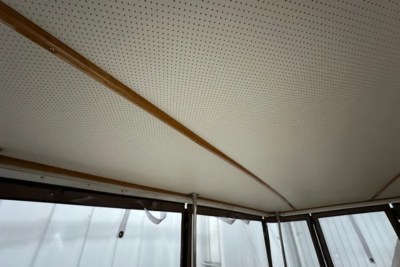 Slide: The Image of Perforated ceiling of 1982 Egg Harbor 42 Flybridge Motoryacht with wooden accents. - 19