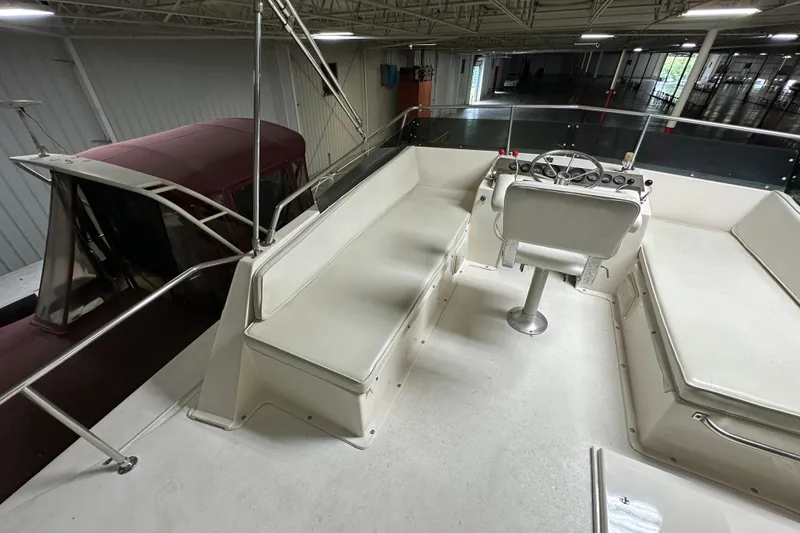 Slide: The Image of 1982 Egg Harbor 42 Flybridge Motoryacht interior with helm and seating area. - 22