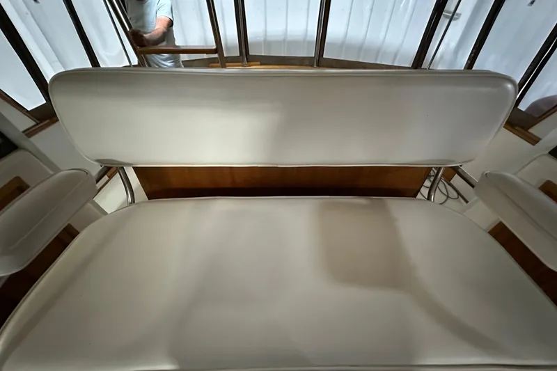 Slide: The Image of White seating on 1982 Egg Harbor 42 Flybridge Motoryacht, showcasing interior design. - 37