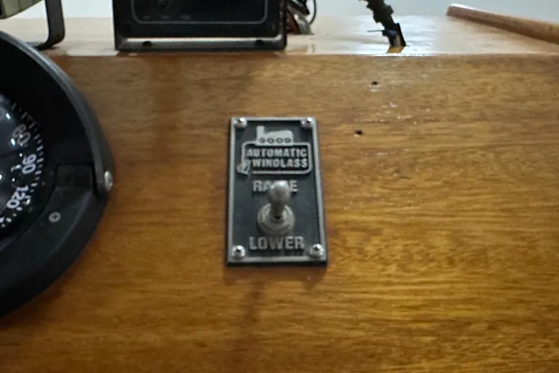 Slide: The Image of Control panel of a 1982 Egg Harbor 42 Flybridge Motoryacht with windlass switch. - 42