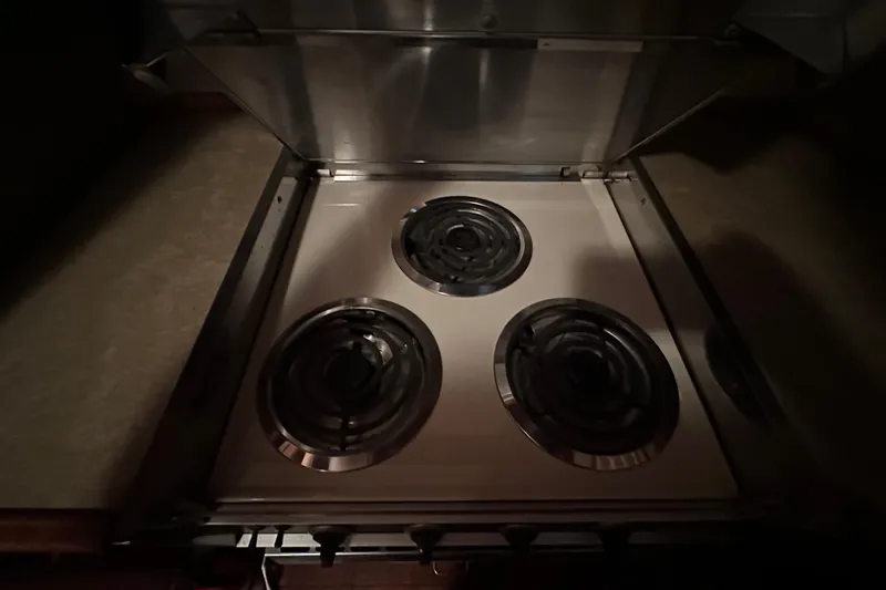 Slide: The Image of Electric stove with three burners on 1982 Egg Harbor 42 Flybridge Motoryacht. - 64