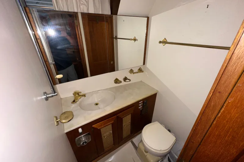 Slide: The Image of Bathroom interior of 1982 Egg Harbor 42 Flybridge Motoryacht with sink and toilet. - 68