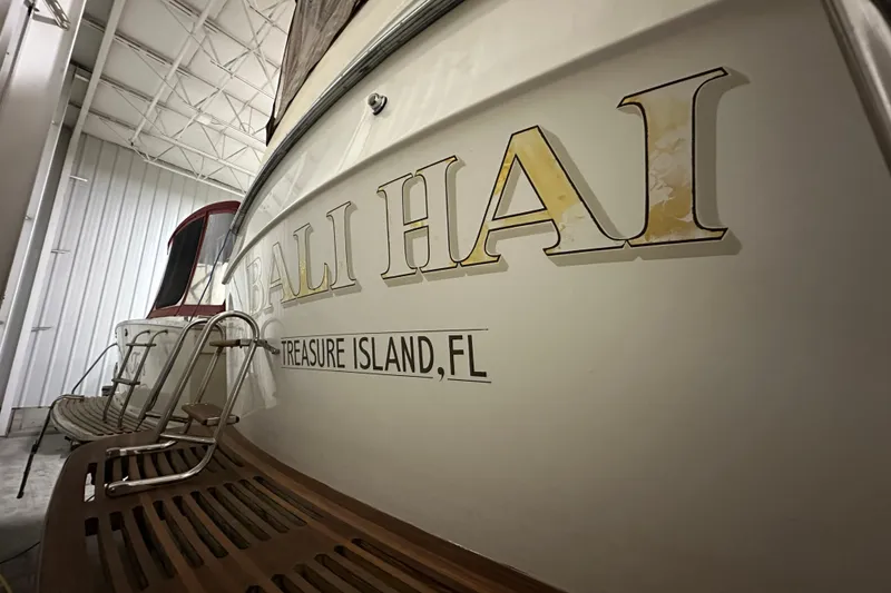 Slide: The Image of 1982 Egg Harbor 42 Flybridge Motoryacht in storage, featuring "Bali Hai" and Treasure Island, FL. - 7