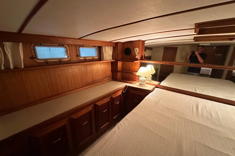 Slide: The Image of Interior of 1982 Egg Harbor 42 Flybridge Motoryacht with wood cabinetry and cozy lighting. - 73