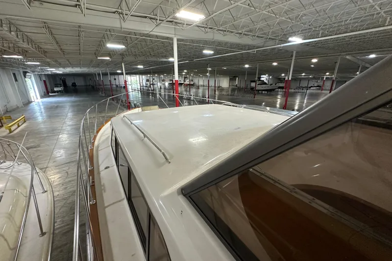 Slide: The Image of 1982 Egg Harbor 42 Flybridge Motoryacht in spacious indoor storage facility. - 8