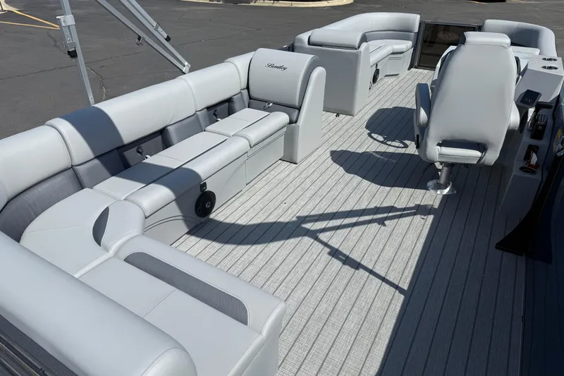Slide: The Image of 2026 Bentley Pontoons Legacy 240 Cruise XL interior with luxurious seating and modern design. - 10
