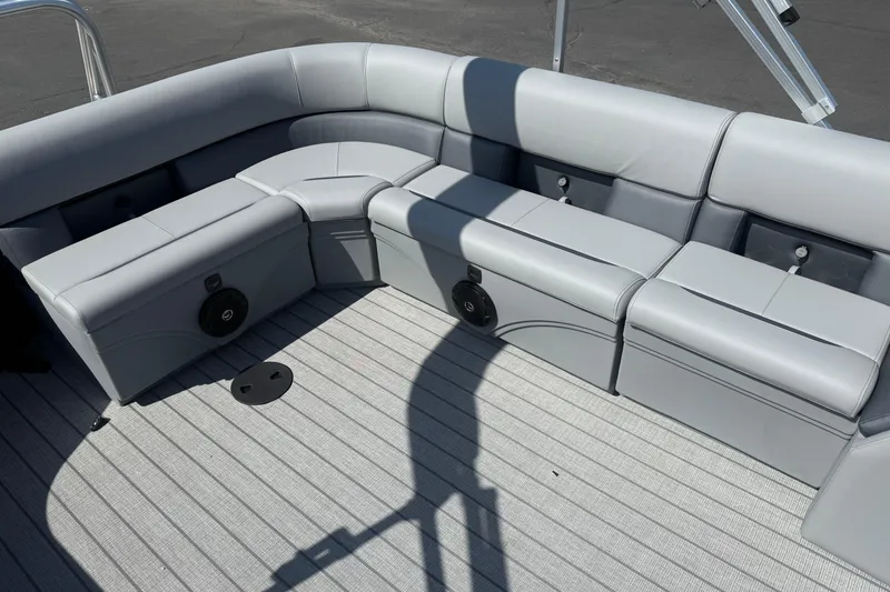 Slide: The Image of Luxurious seating on 2026 Bentley Pontoons Legacy 240 Cruise XL, featuring sleek gray upholstery. - 11