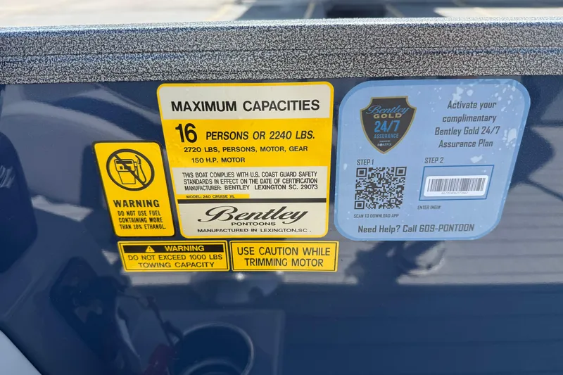 Slide: The Image of 2026 Bentley Pontoons Legacy 240 Cruise XL capacity and safety labels on boat exterior. - 12