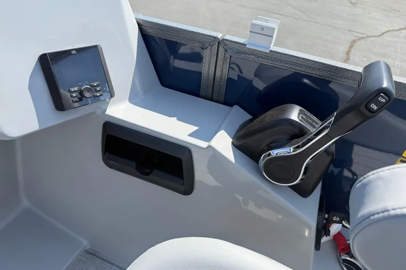 Slide: The Image of Control panel of 2026 Bentley Pontoons Legacy 240 Cruise XL with throttle and display. - 16