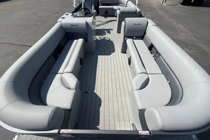Slide: The Image of 2026 Bentley Pontoons Legacy 240 Cruise XL with spacious seating and modern design. - 19