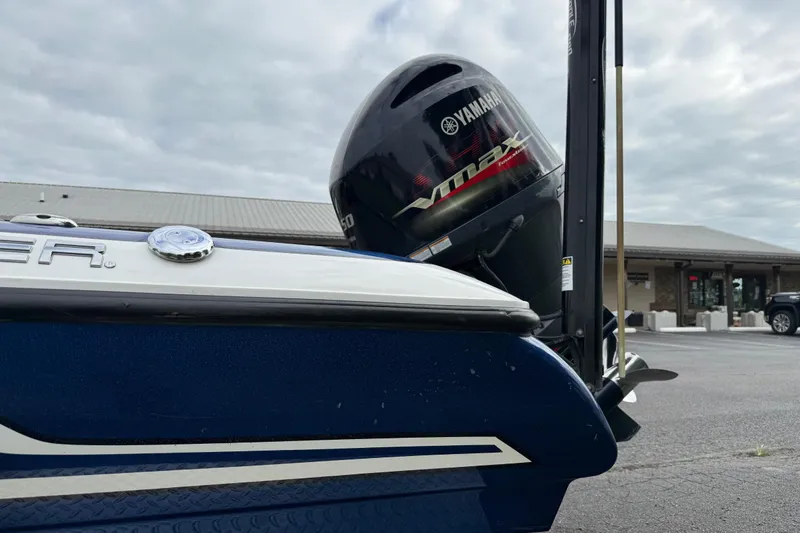 Slide: The Image of 2018 SKEER ZX190 boat with Yamaha VMAX engine in parking lot. - 16