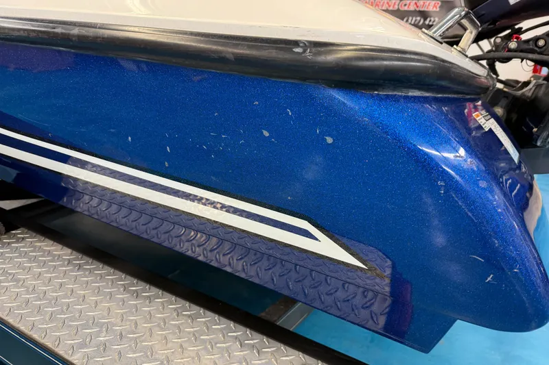 Slide: The Image of Blue SKEER ZX190 2018 model on metal platform, close-up view. - 24