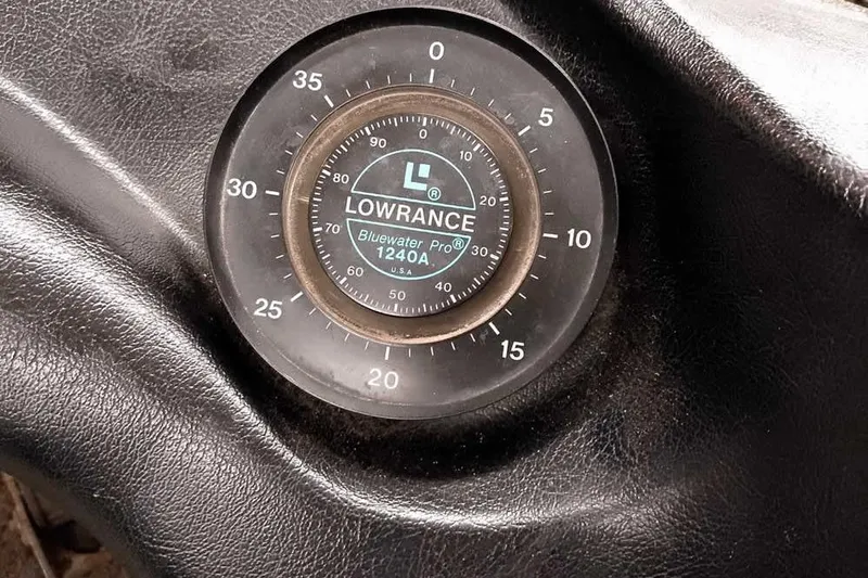 Slide: The Image of Lowrance Bluewater Pro 1240A depth gauge on 1996 Ranger 487VS boat dashboard. - 31