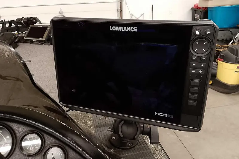 Slide: The Image of Lowrance HDS-12 fishfinder on 1996 Ranger 487VS boat dashboard. - 33