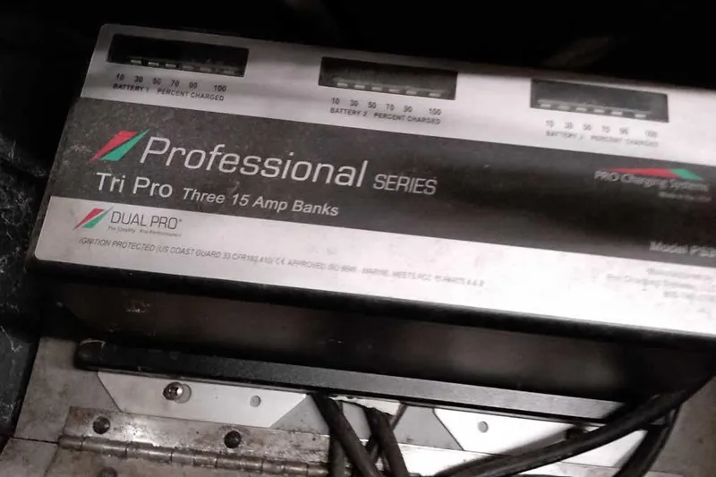 Slide: The Image of Professional Series Tri Pro battery charger with three 15 amp banks, model 1996 Ranger 487VS. - 39