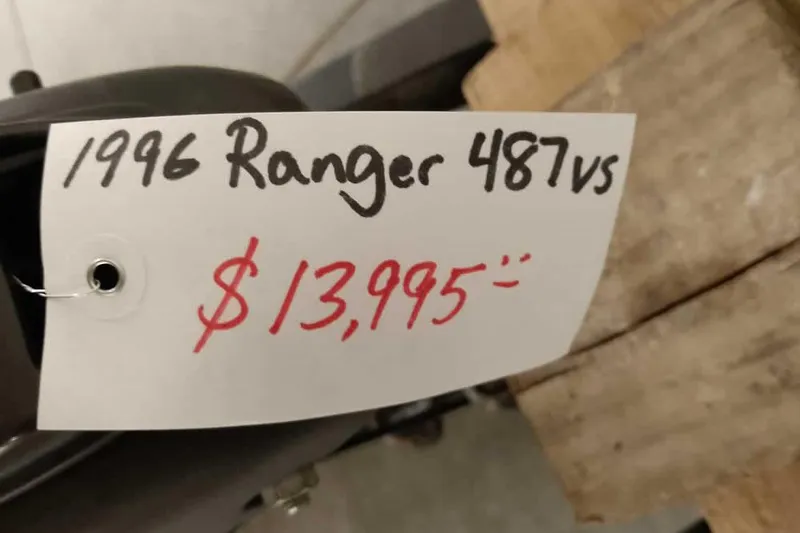 Slide: The Image of 1996 Ranger 487VS price tag showing $13,995 on a white label. - 4