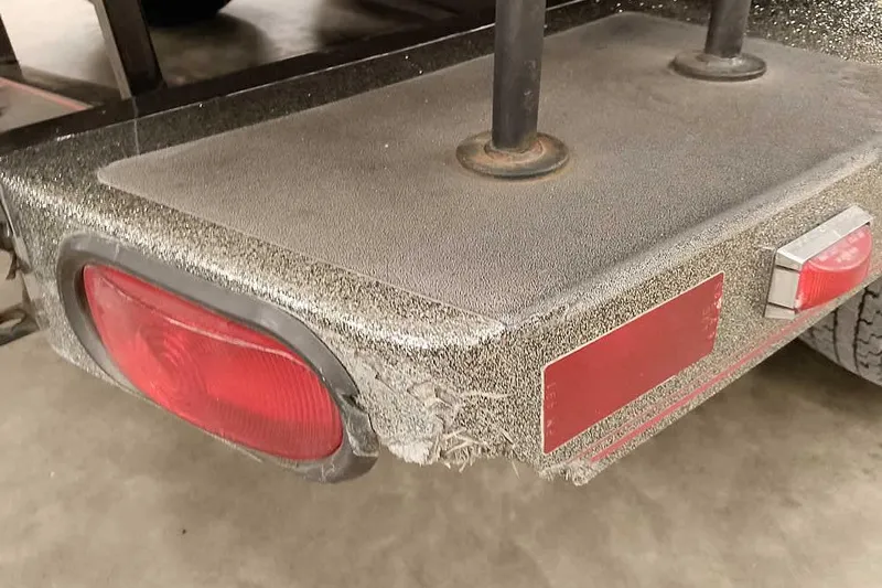 Slide: The Image of Rear view of a 1996 Ranger 487VS boat trailer with red taillights. - 41