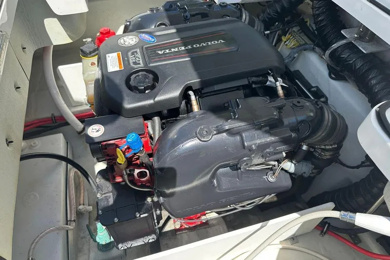 Slide: The Image of Volvo Penta engine in a 2016 Cobalt R5 boat, showcasing detailed components. - 20