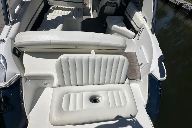 Slide: The Image of 2016 Cobalt R5 boat interior with white leather seating and sleek design. - 7