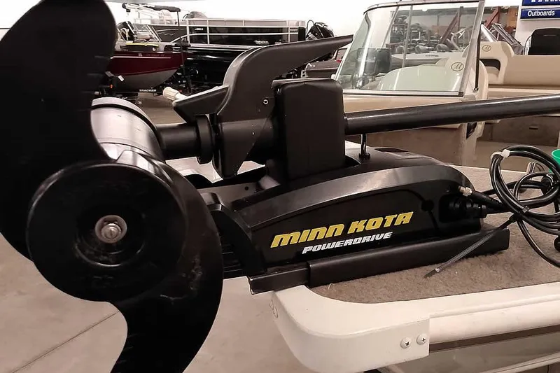 Slide: The Image of Minn Kota PowerDrive motor on 2005 Monark King 185 boat, indoor showroom. - 10