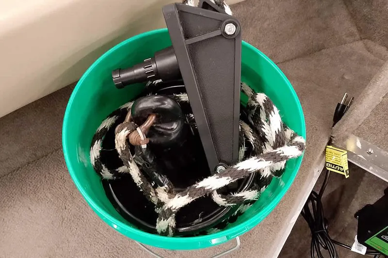 Slide: The Image of Green bucket with rope and black anchor, Monark King 185, 2005 model. - 19