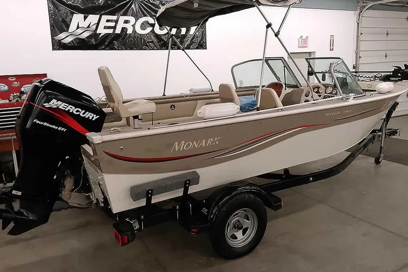 Slide: The Image of 2005 Monark King 185 boat with Mercury FourStroke EFI engine in a garage. - 37