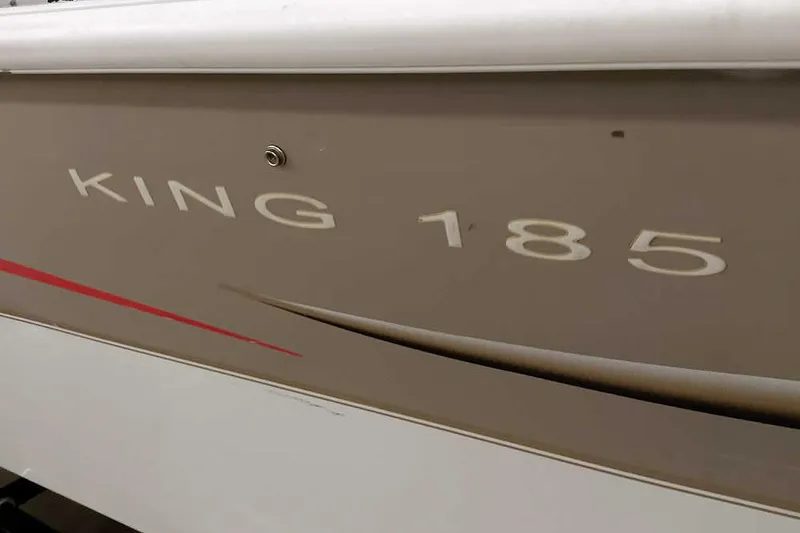 Slide: The Image of Monark King 185 boat, 2005 model, beige exterior with red accent. - 5