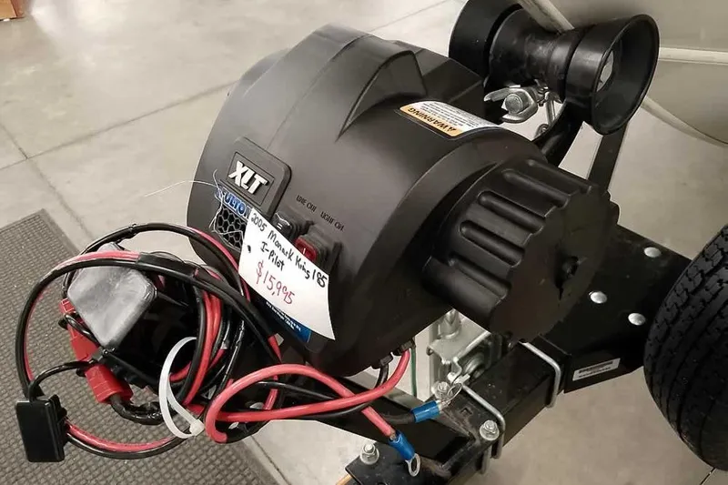 Slide: The Image of 2005 Monark King 185 boat trailer with XLT winch and wiring, priced at $1599.95. - 8