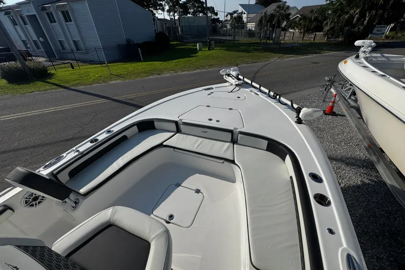 Slide: The Image of 2024 Tidewater 2300 Carolina Bay boat with spacious seating and modern design. - 11