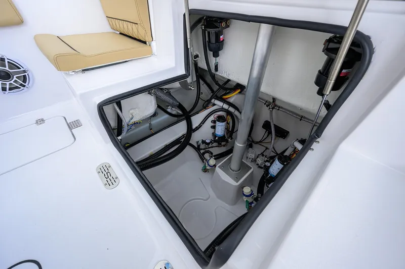 Slide: The Image of 2026 Sportsman Heritage 261 Center Console boat interior wiring and components. - 12