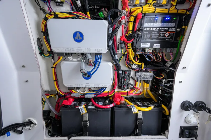 Slide: The Image of 2026 Sportsman Heritage 261 Center Console electrical system with wiring and battery setup. - 25