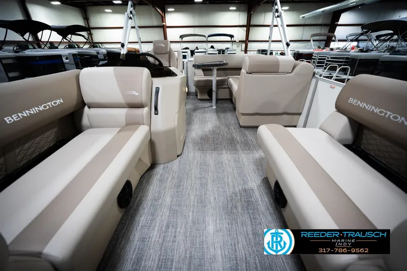 Slide: The Image of 2026 Bennignton 168 SL pontoon boat interior with beige seating and modern design. - 15