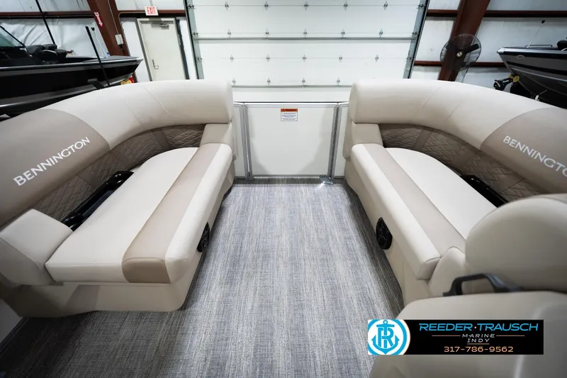 Slide: The Image of 2026 Bennignton 168 SL boat interior with beige seating and modern design. - 18