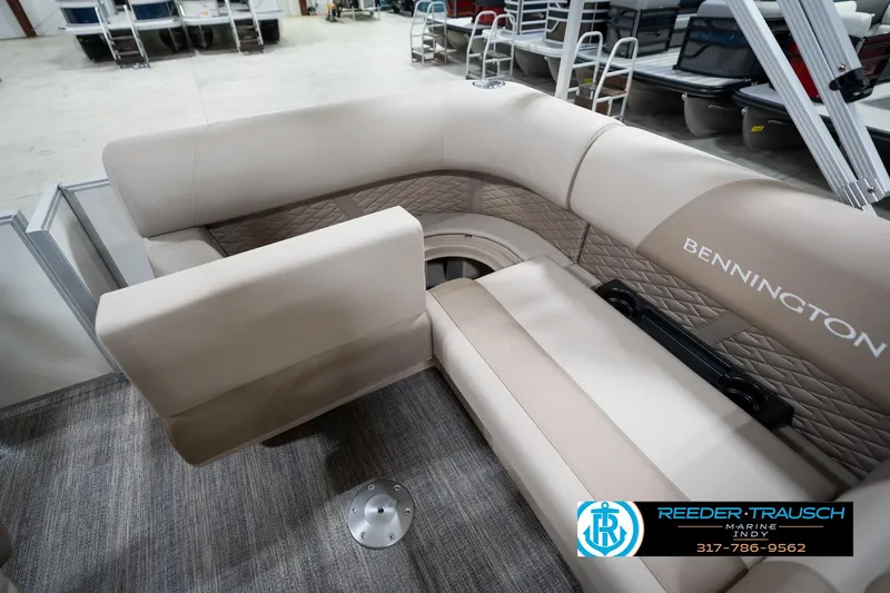 Slide: The Image of Luxurious interior of 2026 Bennignton 168 SL boat with plush seating and elegant design. - 23