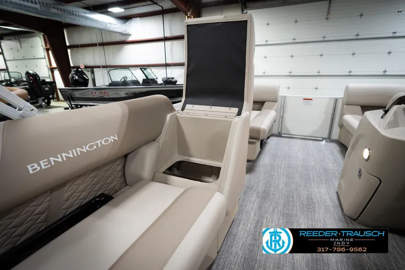 Slide: The Image of 2026 Bennignton 168 SL pontoon boat interior with beige seating and modern design. - 25